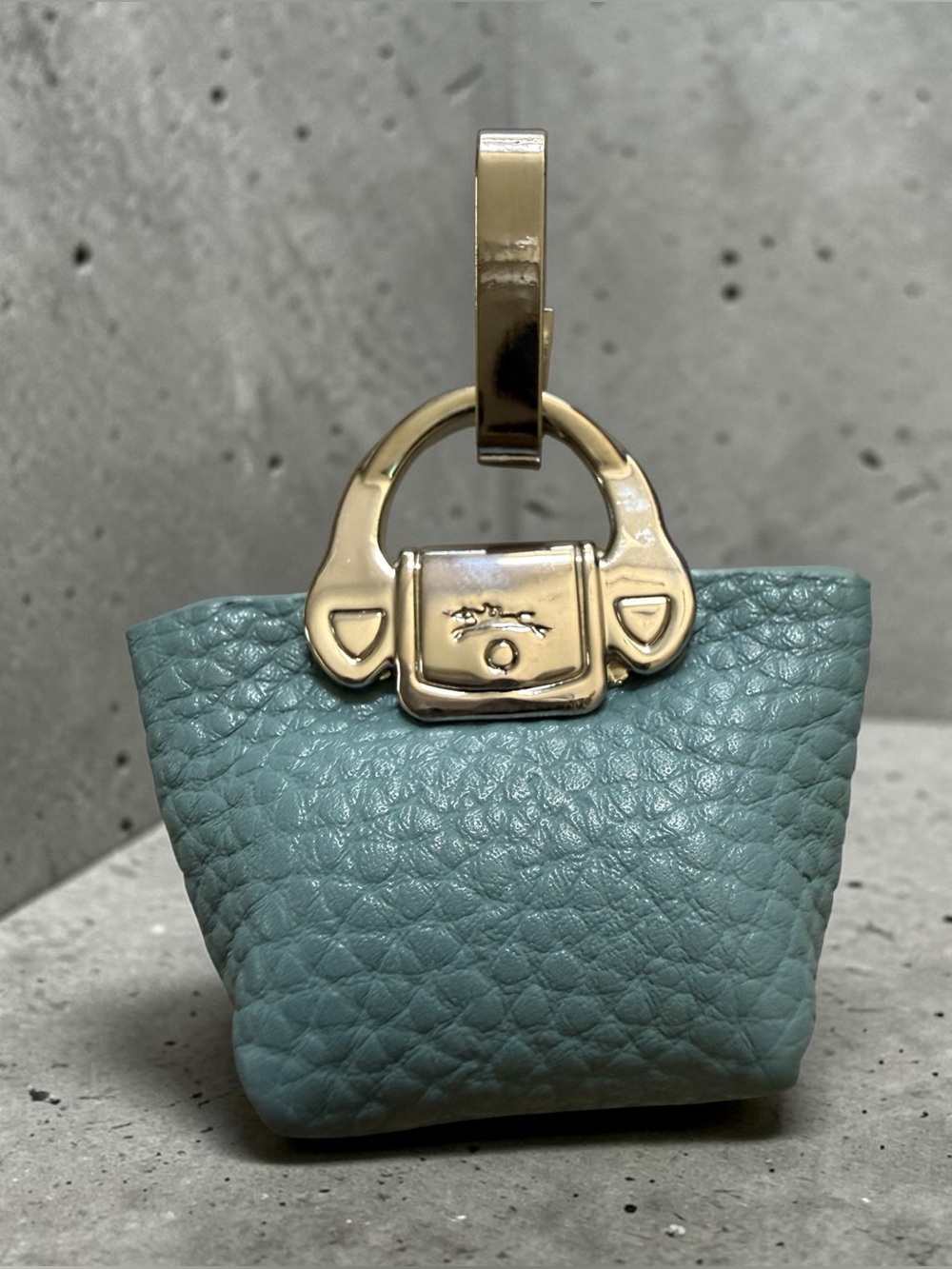 Longchamp teal leather key holder with gold hardware